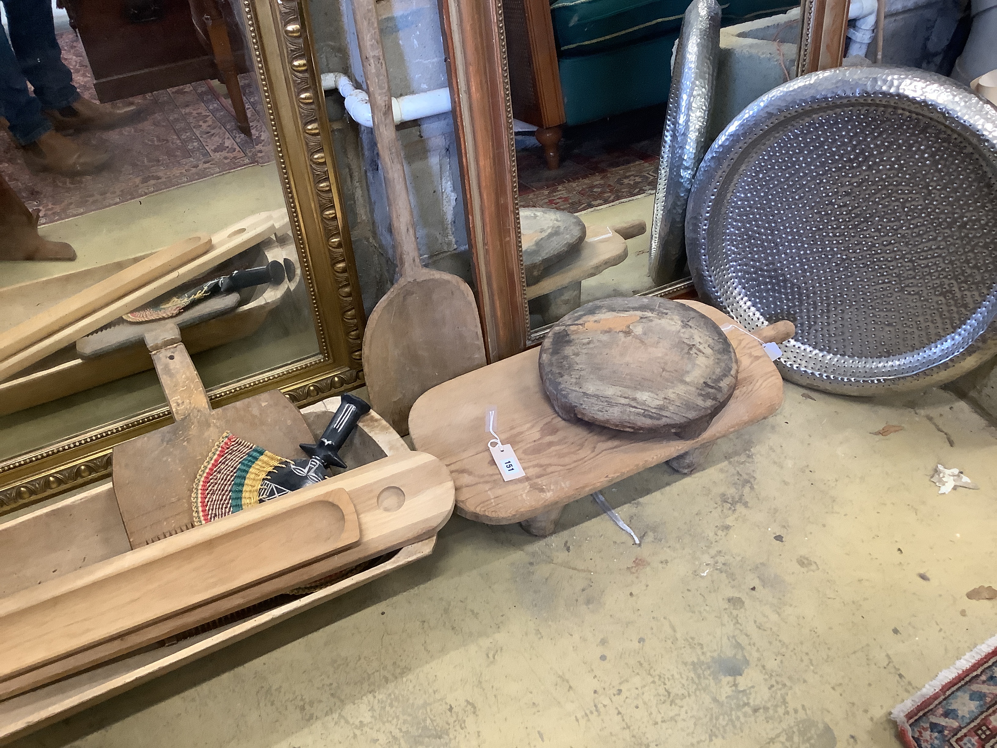 A 19th century fruitwood trough, a provincial bread paddle, two provincial stools, etc